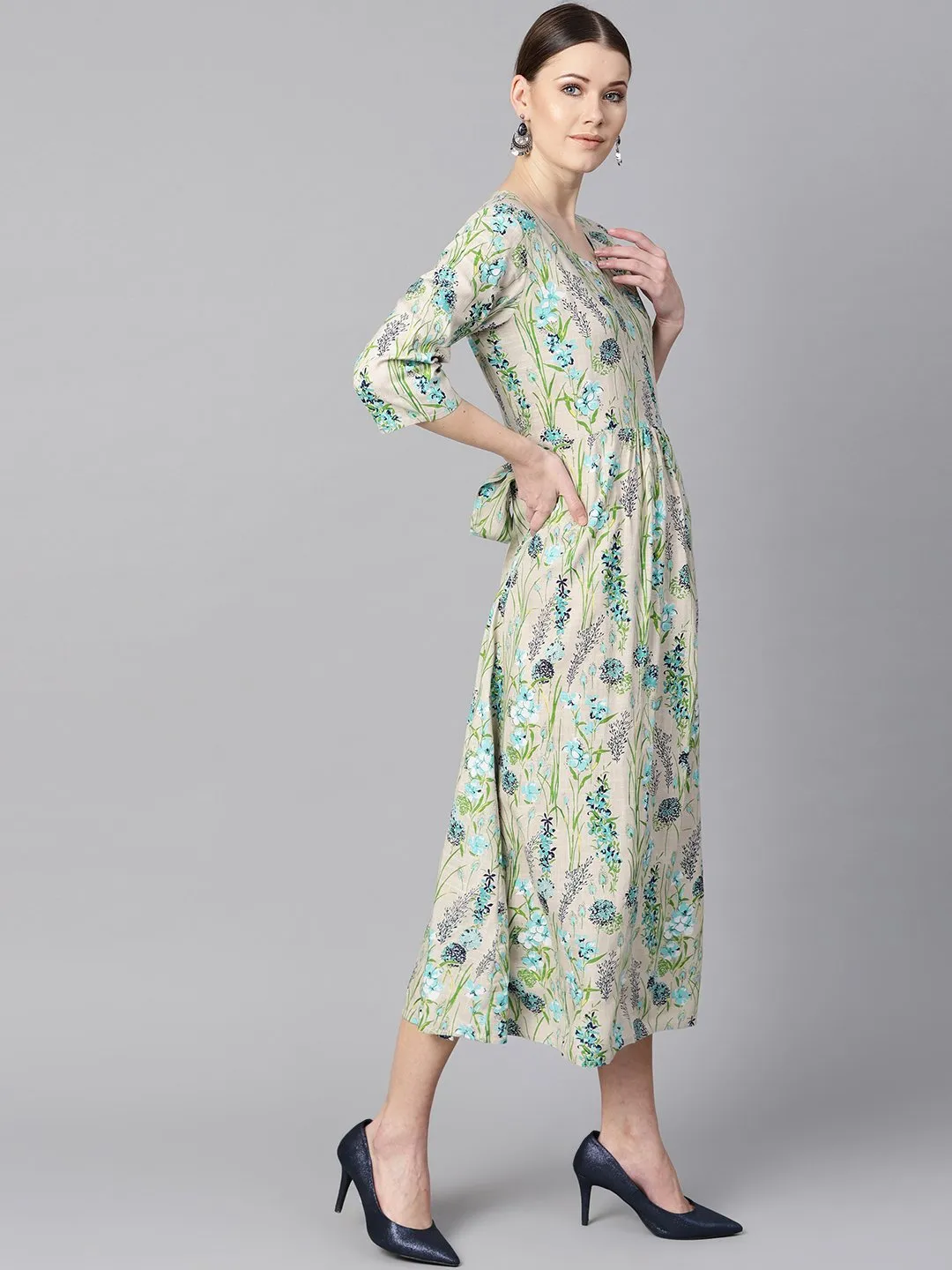 Floral Print Dress With Gathers In Centre With A Belt At The Back